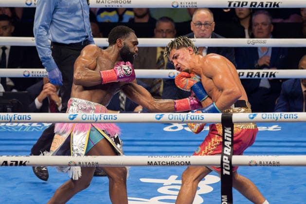June 28, 2026, Brooklyn, New York, USA: XANDER ZAYAS (red trunks) battles JARON ENNIS in a bout for the WBO and WBA World Super-Welterweight titles at the Barclays Center in Brooklyn, New York. Brooklyn USA - ZUMAp109 20260628_zaf_p109_006 Copyright: xJoelxPlummerx