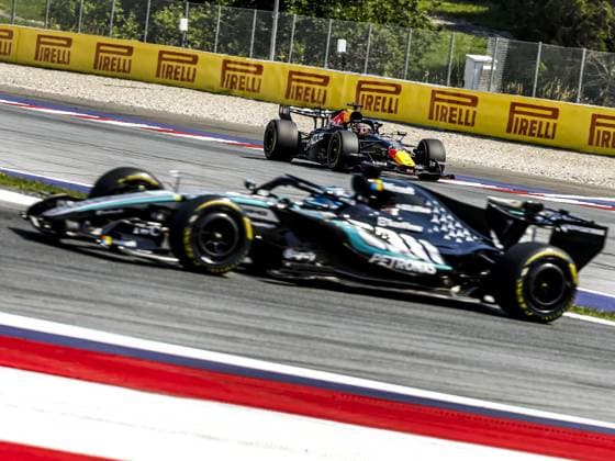 SPIELBERG - Max Verstappen (Red Bull Racing) with George Russell (Mercedes) in the foreground at the Red Bull Ring race track during the Austrian Grand Prix. SEM VAN DER WAL ANP xVIxANPxSportx xxANPxIVx 562268586 originalFilename: 562268586.jpg