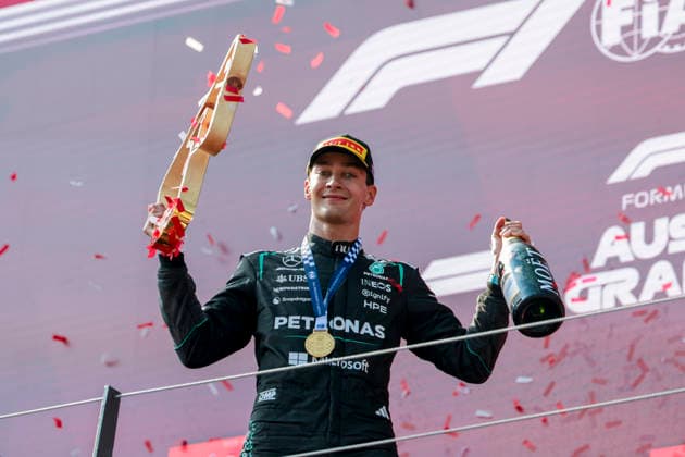 MOTORSPORTS, FORMULA 1 - GP of Austria 2026 SPIELBERG,AUSTRIA,28.JUN.26 - MOTORSPORTS, FORMULA 1 - Grand Prix of Austria, Red Bull Ring, award ceremony. Image shows the rejoicing of George Russell (GBR Mercedes) . keywords: trophy.  GEPAxpictures xMatthiasxTrinkl
