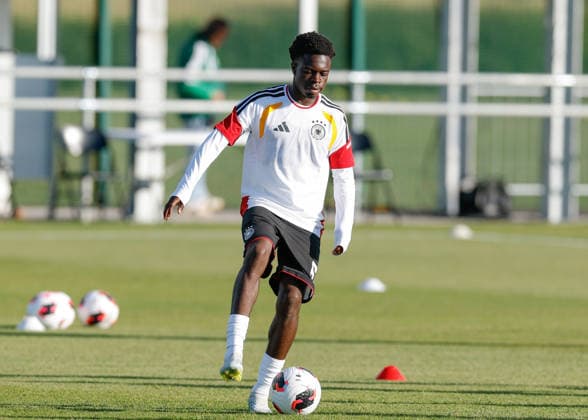 Denbighshire, Wales, 28th June 2026. Boris Mamuzah Lum of Germany warms up ahead of the Germany U19 vs Denmark U19 UEFA European U19 Championship match at Central Park, Denbighshire. Picture credit should read: Cody Froggatt Sportimage EDITORIAL USE ONLY. No use with unauthorised audio, video, data, fixture lists, club league logos or live services. Online in-match use limited to 120 images, no video emulation. No use in betting, games or single club league player publications. SPI_006_CF_GERMANY_U19_V_DENMARK_U19 SPI-4848-0006