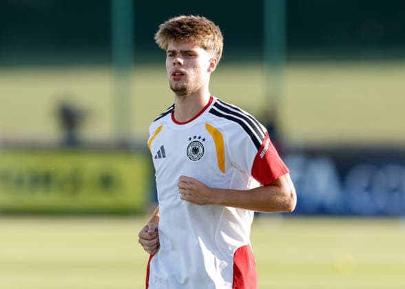 Denbighshire, Wales, 28th June 2026. Mick Schmetgens of Germany warms up ahead of the Germany U19 vs Denmark U19 UEFA European U19 Championship match at Central Park, Denbighshire. Picture credit should read: Cody Froggatt Sportimage EDITORIAL USE ONLY. No use with unauthorised audio, video, data, fixture lists, club league logos or live services. Online in-match use limited to 120 images, no video emulation. No use in betting, games or single club league player publications. SPI_009_CF_GERMANY_U19_V_DENMARK_U19 SPI-4848-0009