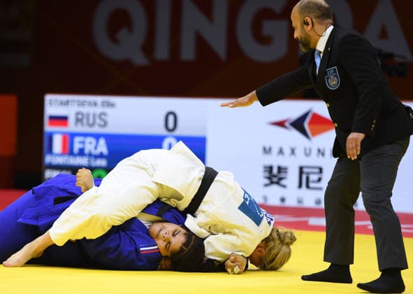 (260628) -- QINGDAO, June 28, 2026 -- Elis Startseva (C) of Russia competes against Lea Fontaine of France during the women s +78kg final match at the IJF World Judo Tour Qingdao Grand Prix 2026 in Qingdao, east China s Shandong Province, June 28, 2026. ) (SP)CHINA-QINGDAO-JUDO-GRAND PRIX 2026(CN) LixZiheng 