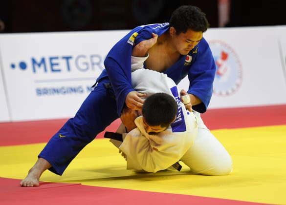 (260628) -- QINGDAO, June 28, 2026 -- Ota Hyoga (Top) of Japan competes against Tamerlan Bashaev of Russia during the men s +100kg final match at the IJF World Judo Tour Qingdao Grand Prix 2026 in Qingdao, east China s Shandong Province, June 28, 2026. ) (SP)CHINA-QINGDAO-JUDO-GRAND PRIX 2026(CN) LixZiheng 