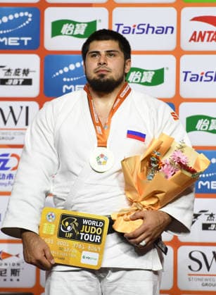 (260628) -- QINGDAO, June 28, 2026 -- Tamerlan Bashaev of Russia poses during the awarding ceremony for the men s +100kg at the IJF World Judo Tour Qingdao Grand Prix 2026 in Qingdao, east China s Shandong Province, June 28, 2026. ) (SP)CHINA-QINGDAO-JUDO-GRAND PRIX 2026(CN) LixZiheng 