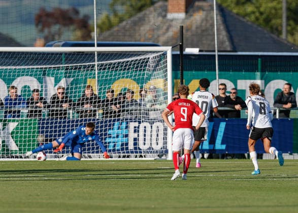 Denbighshire, Wales, 28th June 2026. Francis Onyeka of Germany scores their sides first goal the Germany U19 vs Denmark U19 UEFA European U19 Championship match at Central Park, Denbighshire. Picture credit should read: Cody Froggatt Sportimage EDITORIAL USE ONLY. No use with unauthorised audio, video, data, fixture lists, club league logos or live services. Online in-match use limited to 120 images, no video emulation. No use in betting, games or single club league player publications. SPI_15_CF_GERMANY_U19_V_DENMARK_U19 SPI-4848-0015