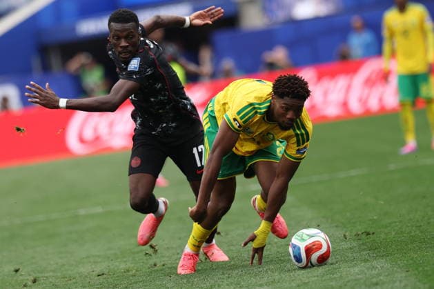 FIFA World Cup, WM, Weltmeisterschaft, Fussball 2026 - Round of 32 - South Africa vs Canada Tani Oluwaseyi (L) of Canada in action against Ime Okon of South Africa during the FIFA World Cup 2026 Round of 32 match South Africa against Canada, in Los Angeles, USA, 28 June 2026. LOS ANGELES United States  Copyright: xCHRISTOPERxTORRESx