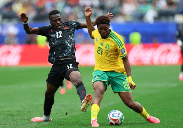 (260629) -- LOS ANGELES, June 29, 2026 -- Ime Okon (R) of South Africa competes with Tani Oluwaseyi of Canada during the round of 32 match between Canada and South Africa at the 2026 FIFA World Cup, WM, Weltmeisterschaft, Fussball at Los Angeles Stadium in Los Angeles, the United States, June 28, 2026. ) (SP)U.S.-LOS ANGELES-FOOTBALL-FIFA WORLD CUP-ROUND OF 32-CAN VS RSA BaixXuefei 