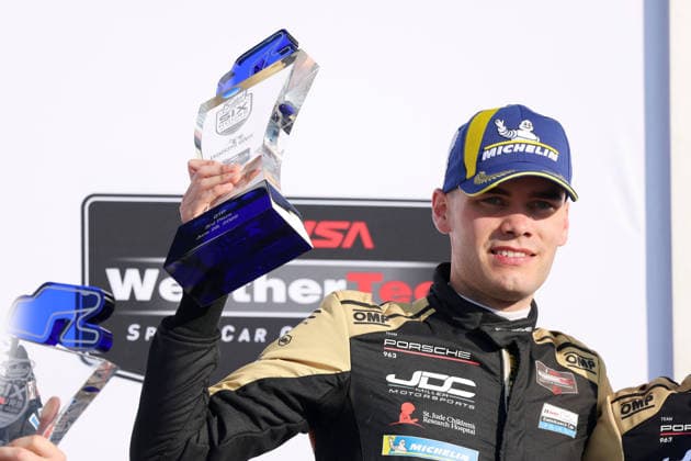 Dritter Laurin Heinrich (GER) Porsche 963 83 vom JDC Miller Motorsport Team mit dem Pkal auf dem Podium, 6 Stunden Watkins Glen, IMSA Rennserie, 28.06.2026, Staat New York, USA, GTP Klasse, *** Third place: Laurin Heinrich (GER) in the Porsche 963 83 from the JDC Miller Motorsport Team, with Pkal on the podium, 6 Hours of Watkins Glen, IMSA Series, June 28, 2026, New York State, USA, GTP class,