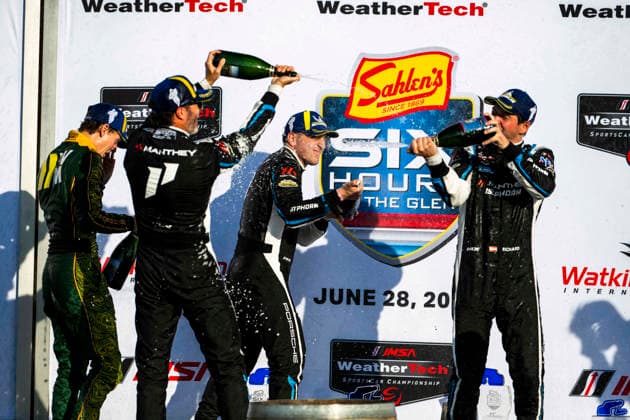 AUTO - 6 HOURS OF THE GLEN 2026 912 HARDWICK Ryan (usa), PERA Riccardo (ita), SCHURING Morris (nld), Manthey 1st Phorm, Porsche 911 GT3 R (992.2), podium during the Six Hours of the Glen 2026, 6th round of the 2026 IMSA WeatherTech SportsCar Championship, from June 26 to 28 on the Watkins Glen International in Watkins Glen, New York, United States of America - Watkins GlenUnited States  Copyright: xFabrizioxBoldonix