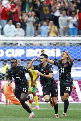 Football: 2026 World Cup Canada s Stephen Eustaquio (7) celebrates with Richie Laryea (22) and Niko Sigur (23) after scoring in second-half stoppage time for a 1-0 win over South Africa in the football World Cup round of 32 at Los Angeles Stadium in Inglewood, California, on June 28, 2026  A14AA0005620534P