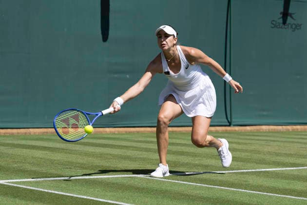 RECORD DATE NOT STATED 29th June 2026; All England Lawn Tennis and Croquet Club, London, England; Wimbledon Tennis Tournament, Day One; Belinda Bencic (SUI) stretches for a forehand in her first round match against Mika Stojsavljevic (GBR) GodfreyxPitt