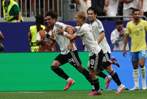 FIFA World Cup, WM, Weltmeisterschaft, Fussball 2026 - Round of 32 - Brazil vs Japan Kaishu Sano of Japan (L) celebrates scoring the 1-0 during the FIFA World Cup 2026 Round of 32 match Brazil against Japan, in Houston, USA, 29 June 2026. HOUSTON United States  Copyright: xCHRISTOPHERxNEUNDORFx