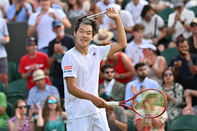 RECORD DATE NOT STATED 29th June 2026; All England Lawn Tennis and Croquet Club, London, England; Wimbledon Tennis Tournament, Day One; Michael Zheng (USA) celebrates winning his first round match against Cameron Norrie (GBR) and removes his headband GodfreyxPitt