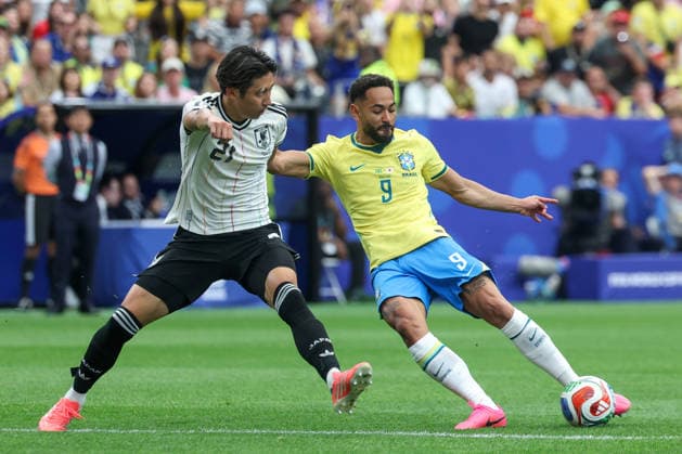 HOUSTON, TX - JUNE 29: Matheus Cunha 9 of Brazil takes a shot attempt while defended by Hiroki Ito 21 of Japan during the FIFA World Cup, WM, Weltmeisterschaft, Fussball 2026 Round of 32 match between Brazil and Japan on June 29, 2026, at Houston Stadium in Houston, Texas. (Photo by David Buono Icon Sportswire) SOCCER: JUN 29 FIFA World Cup 26 Round of 32 - Brazil vs Japan EDITORIAL USE ONLY Icon260629024