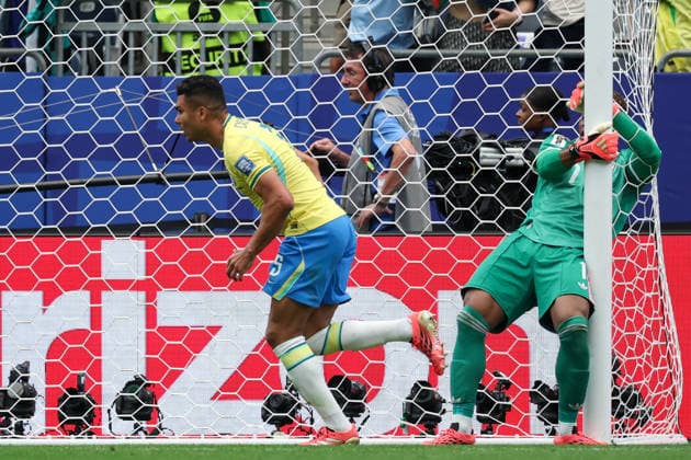 HOUSTON, TX - JUNE 29: Casemiro 5 of Brazil runs past Zion Suzuki 1 of Japan after scoring a goal during the FIFA World Cup, WM, Weltmeisterschaft, Fussball 2026 Round of 32 match between Brazil and Japan on June 29, 2026, at Houston Stadium in Houston, Texas. (Photo by David Buono Icon Sportswire) SOCCER: JUN 29 FIFA World Cup 26 Round of 32 - Brazil vs Japan EDITORIAL USE ONLY Icon260629043