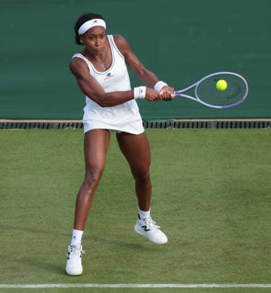 USA S Coco Gauff plays a backhand in her match against Germany s Tamara Korpatsch on day one of the 2026 Wimbledon Championships in London on Monday, June 29, 2026.  LON2026062957 HUGOxPHILPOTT
