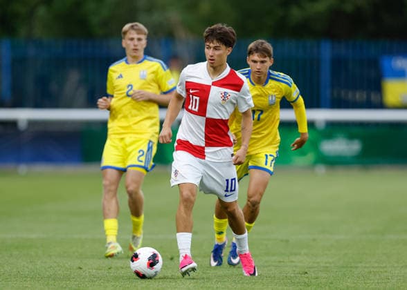Bangor, Wales, 29th June 2026. Patrice Covic of Croatia passes the ball during the Croatia U19 vs Ukraine U19 UEFA European U19 Championship match at Bangor City Stadium, Bangor. Picture credit should read: Cody Froggatt Sportimage EDITORIAL USE ONLY. No use with unauthorised audio, video, data, fixture lists, club league logos or live services. Online in-match use limited to 120 images, no video emulation. No use in betting, games or single club league player publications. SPI_006_CF_CROATIA_U19_V_UKRAINE_U19 SPI-4855-0005