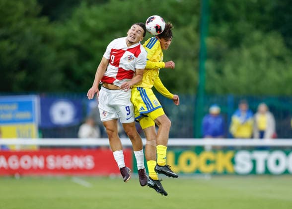 Bangor, Wales, 29th June 2026. Ivan Baric of Croatia and Yaroslav Mylokost of Ukraine battle for the ball during the Croatia U19 vs Ukraine U19 UEFA European U19 Championship match at Bangor City Stadium, Bangor. Picture credit should read: Cody Froggatt Sportimage EDITORIAL USE ONLY. No use with unauthorised audio, video, data, fixture lists, club league logos or live services. Online in-match use limited to 120 images, no video emulation. No use in betting, games or single club league player publications. SPI_010_CF_CROATIA_U19_V_UKRAINE_U19 SPI-4855-0009