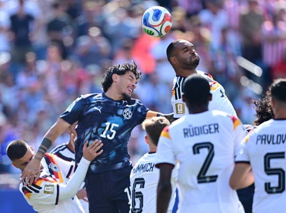 Germany v Paraguay - FIFA World Cup, WM, Weltmeisterschaft, Fussball 2026 - Round of 32 FOXBOROUGH, USA - JUNE 29: Jonathan Tah (rear R) of Germany in action against Gustavo Gomez (15) of Paraguay during the 2026 FIFA World Cup Round of 32 match between Germany and Paraguay at Boston Stadium (Gillette Stadium) in Foxborough, Massachusetts, United States on June 29, 2026. Abdulhamid Hosbas Anadolu Massachusetts United States. Editorial use only. Please get in touch for any other usage.  Copyright: x2026xAnadoluxAbdulhamidxHosbasx
