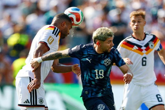 BOSTON STADIUM FOXBOROUGH MASSACHUSETTS USA 29.06.2026 FIFA MISTRZOSTWA SWIATA 2026 W PILKA NOZNA W USA MEKSYK I KANADA MECZ FAZA PUCHAROWA 1 16 NIEMCY I PARAGWAJ FIFA World Cup, WM, Weltmeisterschaft, Fussball 2026 Round of 32 match between Germany and Paraguay at Boston Stadium in Foxborough, Massachusetts on June 29, 2026. N Z Germany defender Jonathan Tah 4 Paraguay forward Julio Enciso 19 KAMIL KRZACZYNSKI NEWSPIX.PL --- newspix.pl  KSK