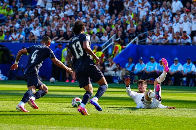 Kai Havertz of Germany is tackled by Juan Caceres of Paraguay Germany v Paraguay, 2026 FIFA World Cup, WM, Weltmeisterschaft, Fussball Round of 32, Football, Boston Stadium, Foxborough, Massachusetts, USA - 29 Jun 2026Foxborough Boston Stadium Massachusetts (MA) United States of America  Copyright: xJavierxGarcia Shutterstockx 16969211ak