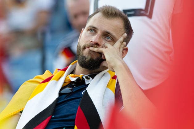June 29, 2026; Foxborough, Massachusetts, USA; A German supporter wonders what went wrong after his side lost to Paraguay in a FIFA World Cup, WM, Weltmeisterschaft, Fussball 2026 Round of 32 match at Boston Stadium. (c) CSM FIFA World Cup 2026: Germany Vs Paraguay JUN 29  - ZUMAc04_ 20260629_zma_c04_057 Copyright: xBurtxGranofskyx