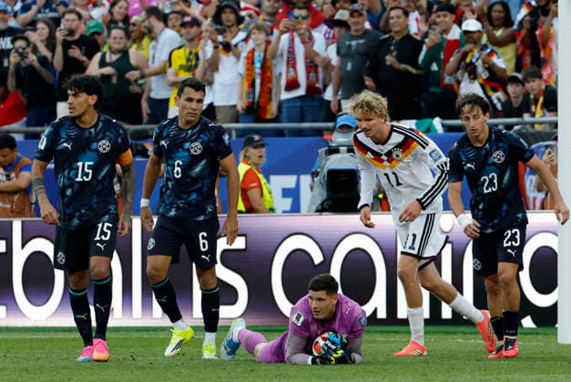 FOXBOROUGH, MA - JUNE 29: Orlando Gill 12 of Paraguay holds onto a shot during a FIFA World Cup, WM, Weltmeisterschaft, Fussball 2026 Round of 32 match between Germany and Paraguay on June 29, 2026 at Boston Stadium in Foxborough, Massachusetts. (Photo by Fred Kfoury III Icon Sportswire) SOCCER: JUN 29 FIFA World Cup 26 Round of 32 - Germany v Paraguay EDITORIAL USE ONLY Icon482260629046
