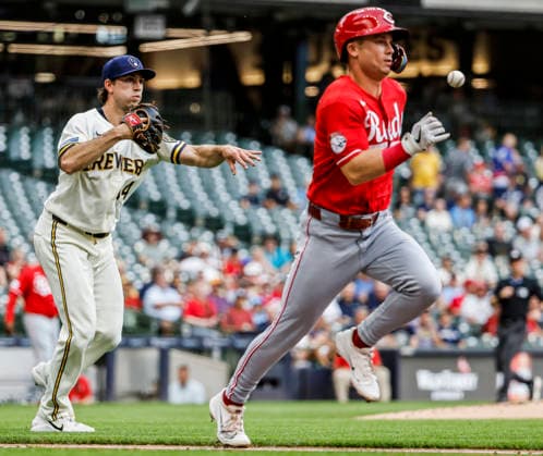 Cincinnati Reds second baseman Matt McLain is thrown out by Milwaukee Brewers pitcher Robert Gasser after laying down a bunt in the second inning of the MLB, Baseball Herren, USA game between the Cincinnati Reds and the Milwaukee Brewers at American Family Field in Milwaukee, Wisconsin on Monday, June 29, 2026.  MIL20260629810 TANNENxMAURY