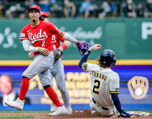 Cincinnati Reds second baseman Edwin Arroyo forces out Milwaukee Brewers second baseman Brice Turang and turns a double play on Milwaukee Brewers catcher William Contreras in the third inning of the MLB, Baseball Herren, USA game between the Cincinnati Reds and the Milwaukee Brewers at American Family Field in Milwaukee, Wisconsin on Monday, June 29, 2026.  MIL20260629816 TANNENxMAURY