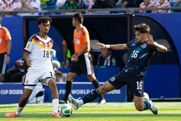 June 29, 2026; Foxborough, Massachusetts, USA; Paraguay midfielder Damian Bobadilla (16) makes the tackle on Germany defender Nathaniel Brown (18) in a FIFA World Cup, WM, Weltmeisterschaft, Fussball 2026 Round of 32 match between Germany and Paraguay at Boston Stadium. (c) CSM - ZUMAc04_ 20260629_zma_c04_067 Copyright: xBurtxGranofskyx