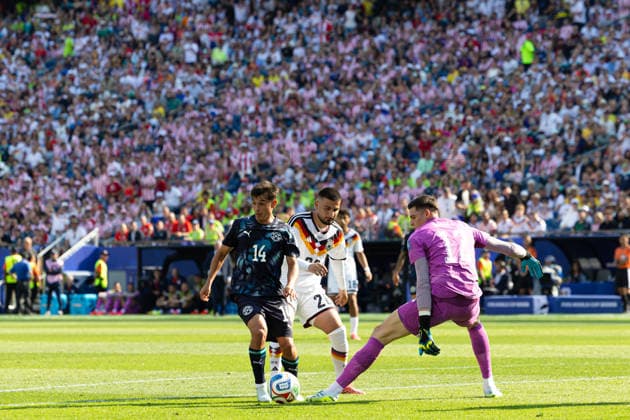 June 29, 2026; Foxborough, Massachusetts, USA; Paraguay midfielder Andres Cubas (14) and Paraguay goalkeeper Orlando Gill (12) collaborate to deny Germany forward Deniz Undav (26) the ball in a FIFA World Cup, WM, Weltmeisterschaft, Fussball 2026 Round of 32 match between Germany and Paraguay at Boston Stadium. (c) CSM - ZUMAc04_ 20260629_zma_c04_076 Copyright: xBurtxGranofskyx