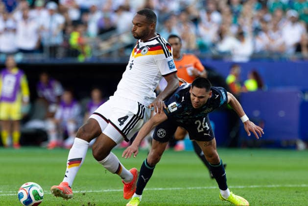 June 29, 2026; Foxborough, Massachusetts, USA; Germany defender Jonathan Tah (4) makes a tackle on Paraguay midfielder Gustavo Caballero (24) in a FIFA World Cup, WM, Weltmeisterschaft, Fussball 2026 Round of 32 match between Germany and Paraguay at Boston Stadium. (c) CSM - ZUMAc04_ 20260629_zma_c04_086 Copyright: xBurtxGranofskyx