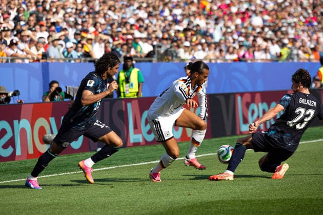 June 29, 2026; Foxborough, Massachusetts, USA; Germany midfielder Leroy Sane (19) evades Paraguay defender Jose Canale (13) and Paraguay midfielder Matias Galarza (23) in a FIFA World Cup, WM, Weltmeisterschaft, Fussball 2026 Round of 32 match between Germany and Paraguay at Boston Stadium. (c) CSM - ZUMAc04_ 20260629_zma_c04_092 Copyright: xBurtxGranofskyx