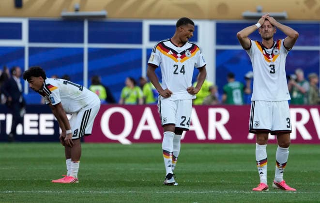 (260630) -- BOSTON, June 30, 2026 -- Players of Germany look dejected after during the round of 32 match between Germany and Paraguay at the 2026 FIFA World Cup, WM, Weltmeisterschaft, Fussball at Boston Stadium in Boston, the United States, June 29, 2026. ) (SP)U.S.-BOSTON-FOOTBALL-FIFA WORLD CUP-ROUND OF 32-GER VS PRY ChenxYichen 