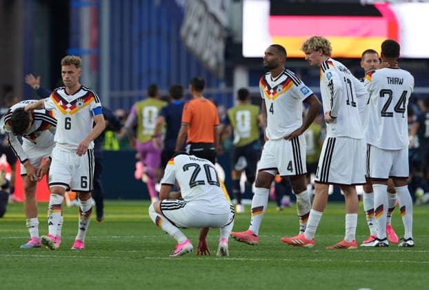 (260630) -- BOSTON, June 30, 2026 -- Members of team Germany react after losing the round of 32 match between Germany and Paraguay at the 2026 FIFA World Cup, WM, Weltmeisterschaft, Fussball at Boston Stadium in Boston, the United States, June 29, 2026. ) (SP)U.S.-BOSTON-FOOTBALL-FIFA WORLD CUP-ROUND OF 32-GER VS PRY HuangxZongzhi 