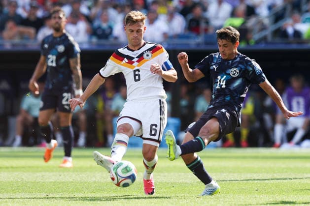 FOXBOROUGH, MASSACHUSETTS - JUNE 29: Joshua Kimmich of Germany and Andres Cubas of Paraguay compete for the ball during the FIFA World Cup, WM, Weltmeisterschaft, Fussball 2026 Round of 32 match between Germany and Paraguay at Boston Stadium on June 29, 2026 in Foxborough, Massachusetts.  Copyright: xWuxZhizhaox 111651327773