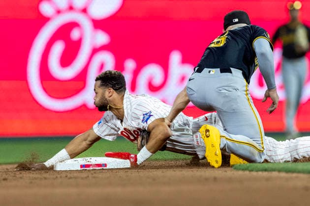 Philadelphia Phillies Justin Crawford is safe on a steal at second before Pittsburgh Pirates second baseman Brandon Lowe (5) can make the tag in the seventh inning, Monday, June 29, 2026, in Philadelphia.  PHI20260629016 LaurencexKesterson