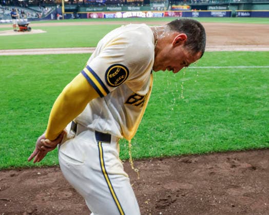 Milwaukee Brewers third baseman Joey Ortiz is soaked with Gatorade for hitting the winning home run in the MLB, Baseball Herren, USA game between the Cincinnati Reds and the Milwaukee Brewers at American Family Field in Milwaukee, Wisconsin on Monday, June 29, 2026. The Brewers defeated the Reds 5-3.  MIL20260629851 TANNENxMAURY