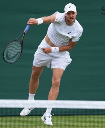Tennis - 2026 Wimbledon Championships - Day Two (Week One) - All England Lawn Tennis & Croquet Club, London - Tuesday 30th June 2026 Men™s Singles, First Round: Yannick Hanfmann (GER) vs.Giovanni Mpetshi Perricard (FRA) Yannick Hanfmann COLORSPORT ANDREW COWIE 