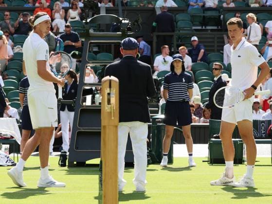 German Alexander Zverev and Belgian Alexander Blockx pictured before a first round game between Belgian Blockx and German Zverev in the Men s singles at the Wimbledon grand slam tennis tournament in London, Britain, Tuesday 30 June 2026. BENOITxDOPPAGNE  x180010817x