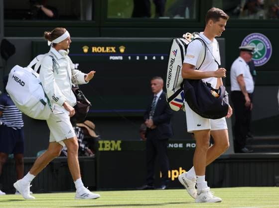 German Alexander Zverev and Belgian Alexander Blockx pictured before a first round game between Belgian Blockx and German Zverev in the Men s singles at the Wimbledon grand slam tennis tournament in London, Britain, Tuesday 30 June 2026. BENOITxDOPPAGNE  x180010867x