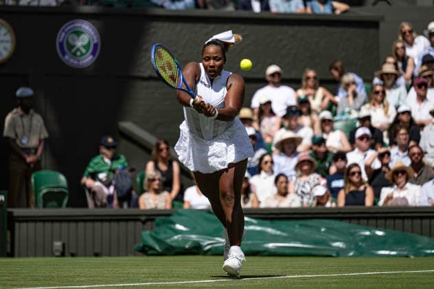 RECORD DATE NOT STATED 30th June 2026; All England Lawn Tennis and Croquet Club, London, England; Wimbledon Tennis Tournament, Day Two; Taylor Townsend (USA) plays a backhand in her first round match against Iga Swiatek (POL) GodfreyxPitt
