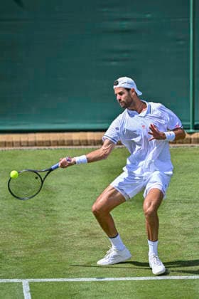 RECORD DATE NOT STATED 30th June 2026; All England Lawn Tennis and Croquet Club, London, England; Wimbledon Tennis Tournament, Day Two; Karen Khachanov plays a forehand in his first round match against Billy Harris (GBR) GodfreyxPitt