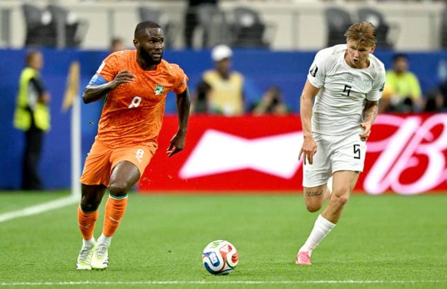 FIFA World Cup, WM, Weltmeisterschaft, Fussball 2026 - Round of 32 - Ivory Coast vs Norway Franck Kessie (L) of Ivory Coast and David Moller Wolfe of Norway in action during the FIFA World Cup 2026 Round of 32 match Ivory Coast against Norway, in Dallas, USA, 30 June 2026. DALLAS United States  Copyright: xALBERTxPENAx