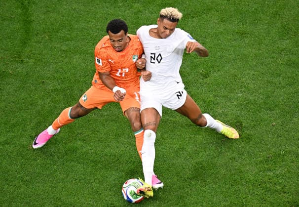 (260701) -- DALLAS, July 1, 2026 -- Antonio Nusa (R) of Norway competes with Guela Doue of Cote d Ivoire during the round of 32 match between Cote d Ivoire and Norway at the 2026 FIFA World Cup, WM, Weltmeisterschaft, Fussball at Dallas Stadium in Dallas, the United States, June 30, 2026. ) (SP)U.S.-DALLAS-FOOTBALL-FIFA WORLD CUP-ROUND OF 32-CIV VS NOR WuxXiaoling 
