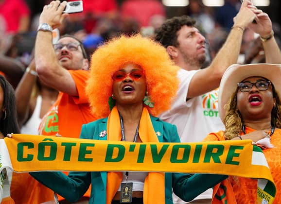 (260701) -- DALLAS, July 1, 2026 -- Fans of Cote d Ivoire are seen before the round of 32 match between Cote d Ivoire and Norway at the 2026 FIFA World Cup, WM, Weltmeisterschaft, Fussball at Dallas Stadium in Dallas, the United States, June 30, 2026. ) (SP)U.S.-DALLAS-FOOTBALL-FIFA WORLD CUP-ROUND OF 32-CIV VS NOR JiaxHaocheng 