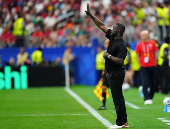 (260701) -- DALLAS, July 1, 2026 -- Emerse Fae, head coach of Cote d Ivoire, gestures during the round of 32 match between Cote d Ivoire and Norway at the 2026 FIFA World Cup, WM, Weltmeisterschaft, Fussball at Dallas Stadium in Dallas, the United States, June 30, 2026. ) (SP)U.S.-DALLAS-FOOTBALL-FIFA WORLD CUP-ROUND OF 32-CIV VS NOR JiaxHaocheng 