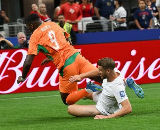 Cote D Ivoire v Norway Round Of 32 - FIFA World Cup, WM, Weltmeisterschaft, Fussball 2026 DALLAS, TEXAS, UNITED STATES JUNE 30, 2026: CÃ te d Ivoire forward Ange-Yoan Bonny ( 9) is challenged by Norway defender Kristoffer Ajer ( 3) during the FIFA World Cup Round of 16 match at Dallas Stadium in Dallas, Texas, USA, on June 30, 2026. DALLAS United States of America Copyright: x xwalidxibrahimx xJNAxPressx