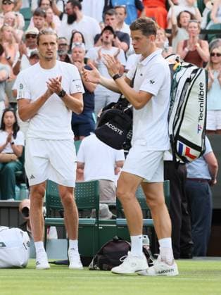 German Alexander Zverev applaud Belgian Alexander Blockx after winning a first round game between Belgian Blockx and German Zverev in the Men s singles at the Wimbledon grand slam tennis tournament in London, Britain, Tuesday 30 June 2026. BENOITxDOPPAGNE  x180029172x