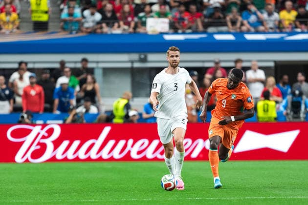 Kristoffer Ajer of Norway (L) runs with the ball under pressure from Ange-Yoan Bonny of Ivory Coast (R) during a FIFA Men’s World Cup 2026 round of 32 football match between Ivory Coast and Norway at Dallas Stadium, in Arlington on June 30th 2026 (Photo by LVDIDI SPP)  Copyright: xLVDIDI SPPx Sportspressphoto_SPR181066